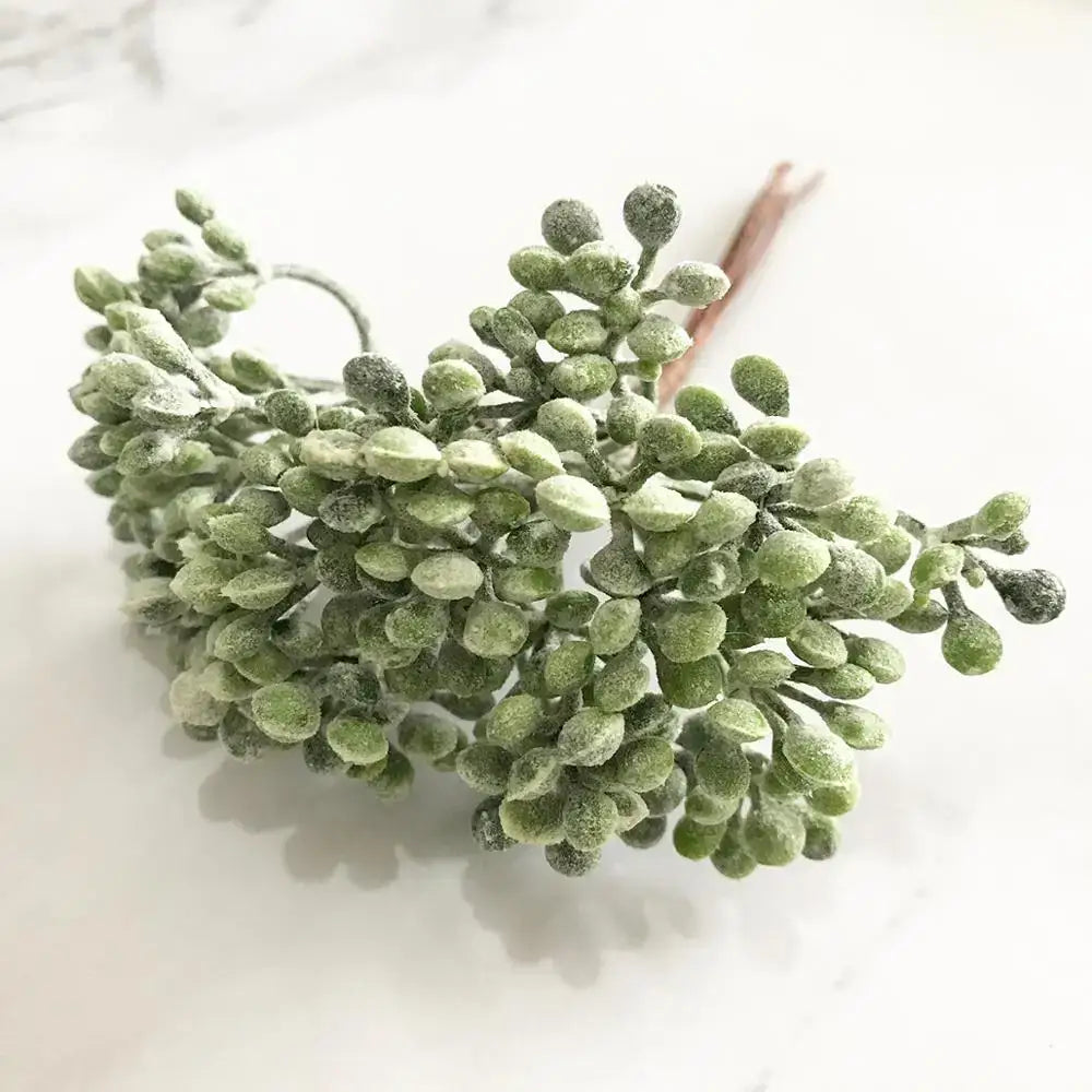 Frosted green artificial berry cluster with delicate rounded berries and slender stems for decorbites green plant decor