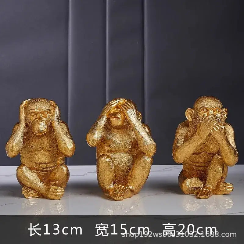 Artisanal three wise golden monkey sculpture with resin finish featuring see no evil hear no evil speak no evil decorbites golden monkey decor