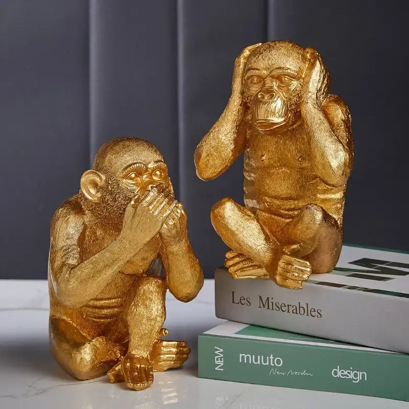 Artisanal golden monkey sculpture featuring three wise monkeys in resin for elegant living room decorbites decorbites golden monkey decor