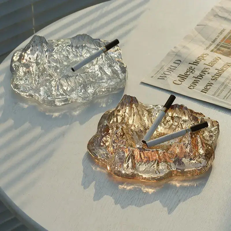 Artistic clear and gold decorbites iceberg glass dessert plates shaped like mountain ranges for dining room decor