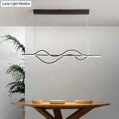 Modern black and white artistic metal dining pendant light fixture with sleek wavy LED design and dark brown ceiling mount