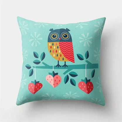 Teal pillow cover featuring a stylized cute owl with colorful feathers perched above heart-shaped strawberries decorbites cute owl