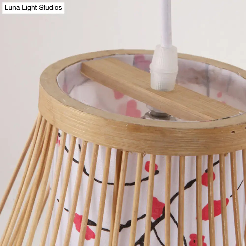Asian pink cherry blossom bamboo teardrop sconce wall lamp with white fabric shade featuring red flowers and branches