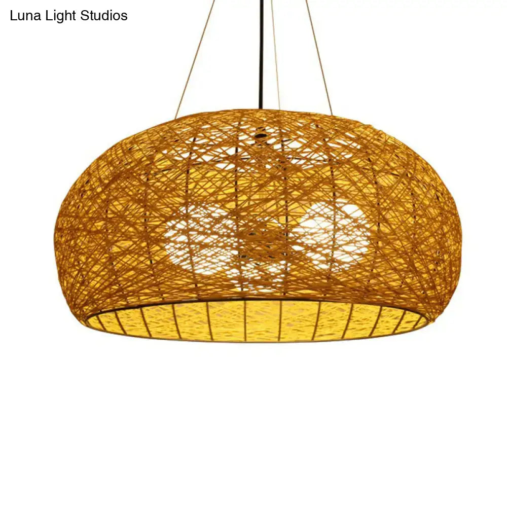 Warm-toned handwoven Asian rattan dome pendant light with e26 e27 bulb base and visible internal lighting