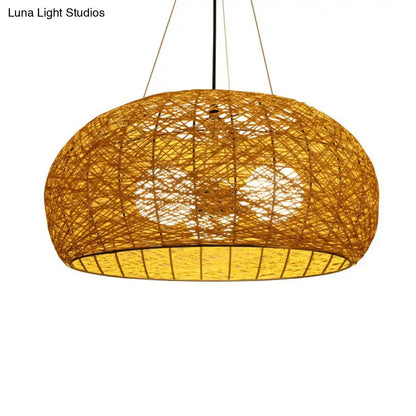 Warm-toned handwoven asian rattan dome pendant light with visible internal lighting and e26 e27 bulb base for dining room