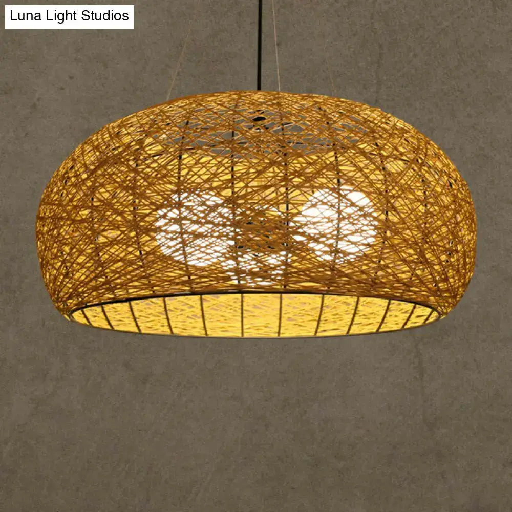 Warm-toned handwoven Asian rattan dome pendant light with visible internal lighting and e26 e27 bulb base for dining room