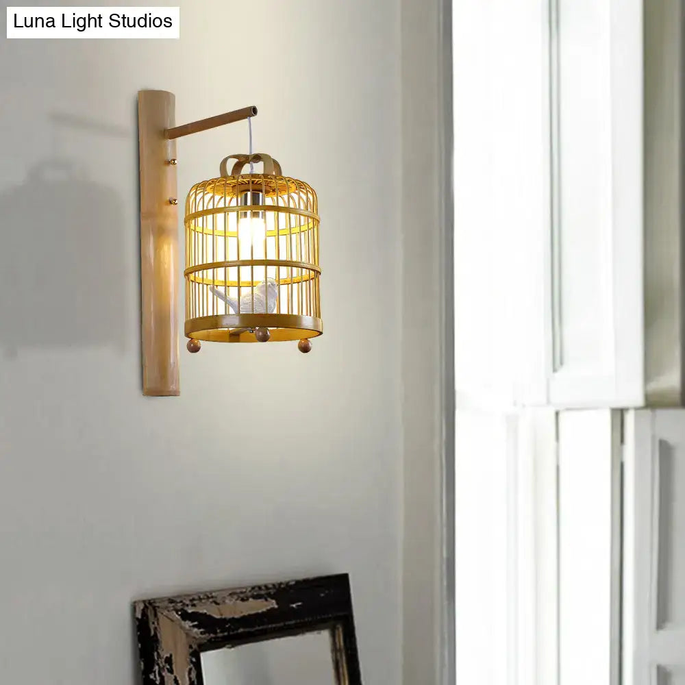 A warm-toned asian wood cage design wall sconce with bamboo and brass accents for bedroom white bird deco 220v-240v