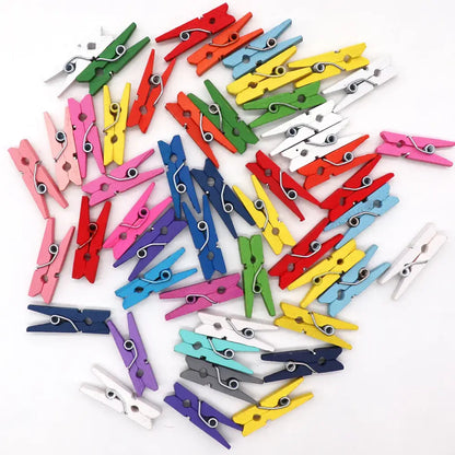 A collection of assorted colorful mini wooden clips with metal springs for bedroom photo decor