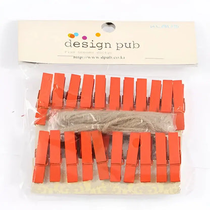 Bright orange mini wooden clips in a clear bag labeled design pub for bedroom photo decor and crafts
