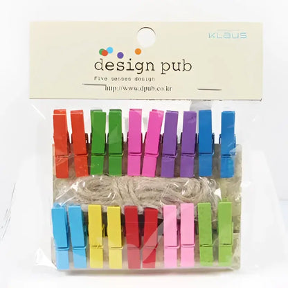 A set of assorted colorful mini wooden clips in vibrant red green pink blue and yellow for bedroom photo decor