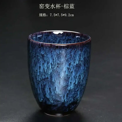 A ceramic kung fu tea cup with deep blue crackle glaze and purple undertones from decorbites ceramic kung set