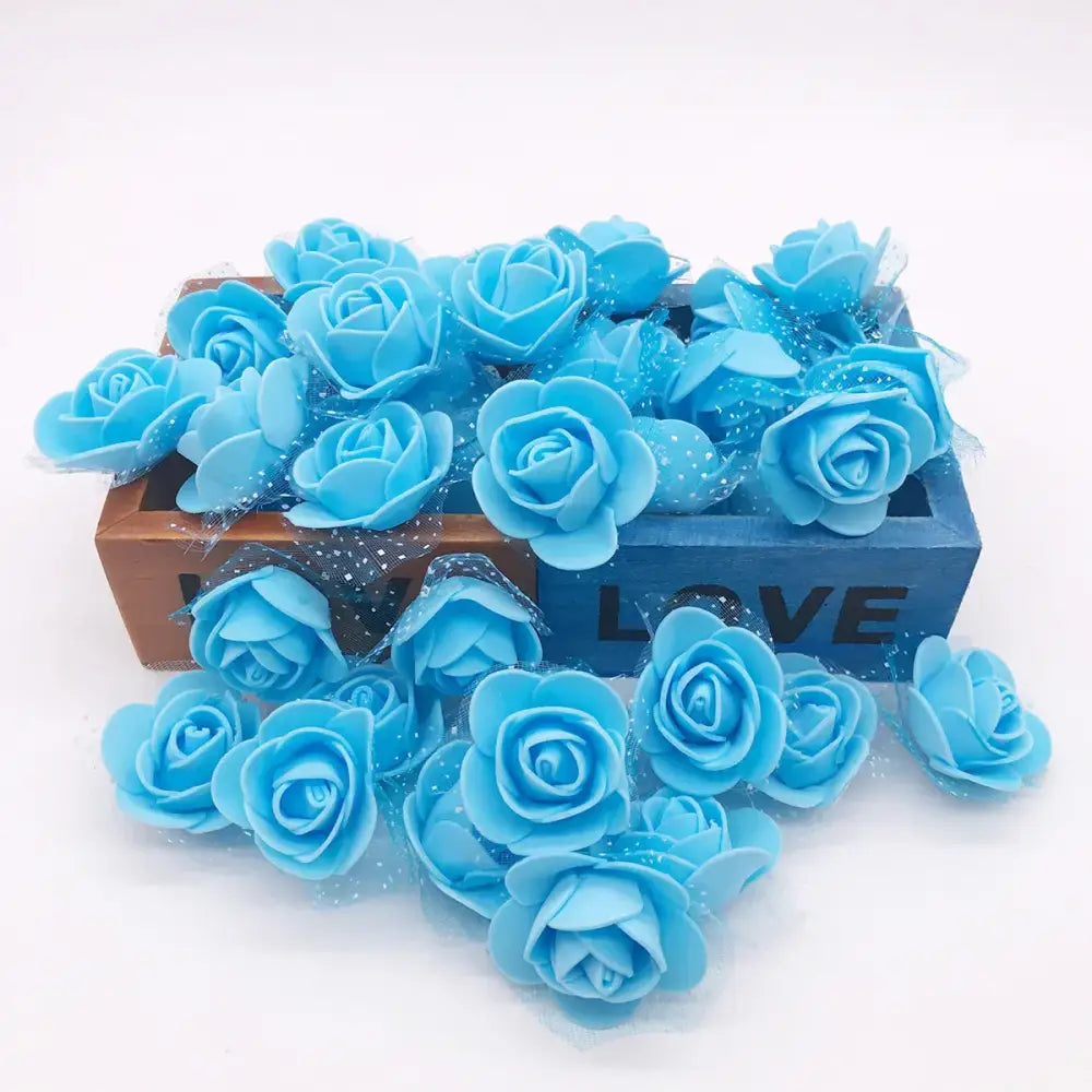 Light blue handmade foam rose flower heads with soft textured petals for decorbites handmade foam wedding decor