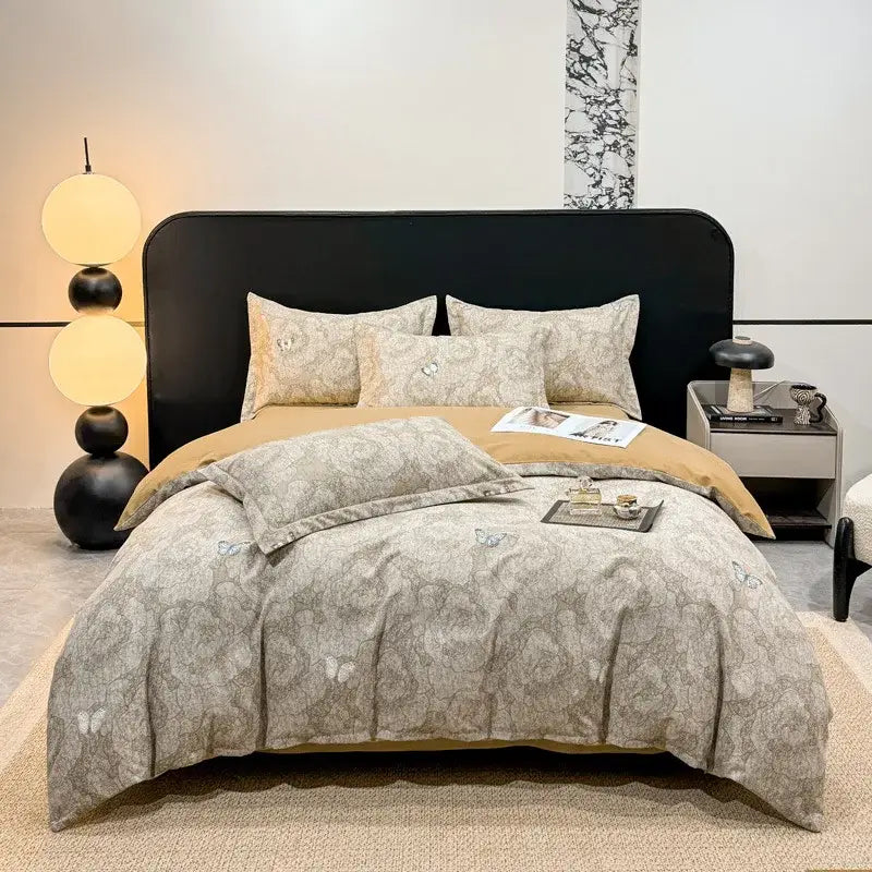 Beige and gray patterned duvet cover set with delicate butterfly embroidery in autumnal leaf cream brushed cotton