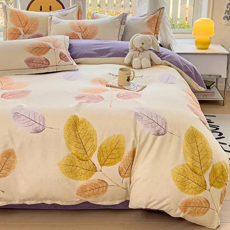 Cream-colored autumnal leaf duvet cover set in brushed cotton featuring yellow orange and purple leaves pattern