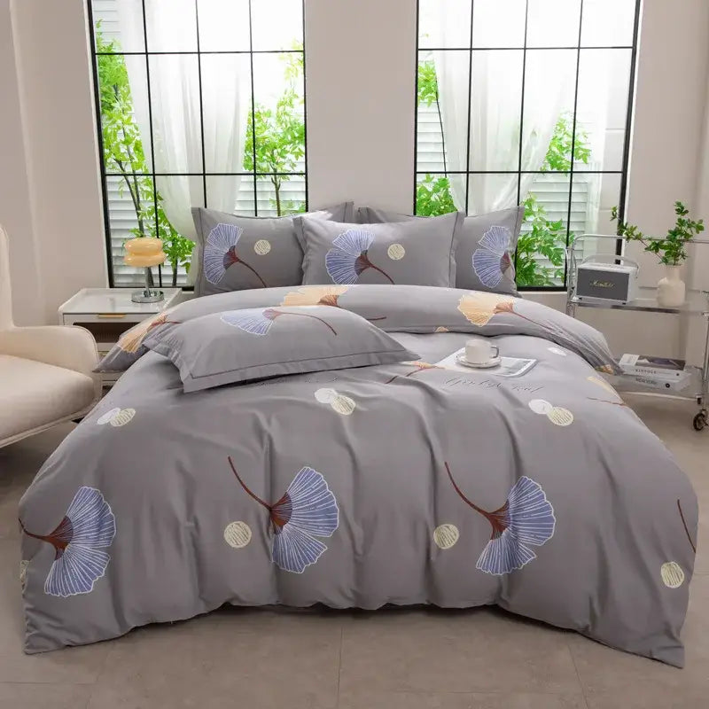 Gray autumnal leaf cream brushed cotton duvet cover set featuring embroidered ginkgo leaf and circular motifs in blue brown cream