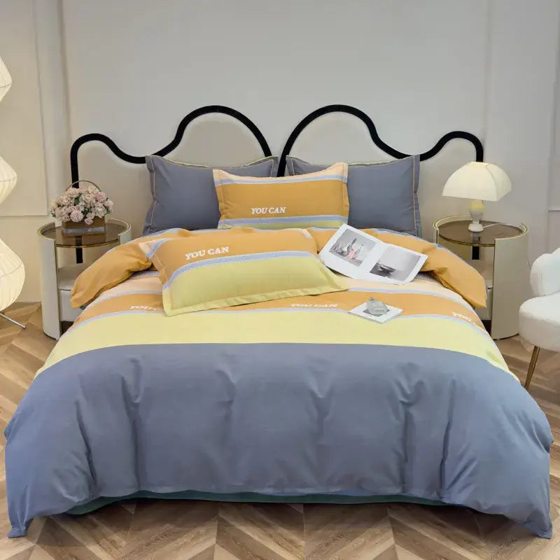 Pastel blue and mustard yellow striped duvet cover set with you can printed pillows in autumnal leaf cream brushed cotton