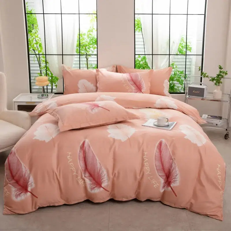 Pink feather-themed duvet cover set with white and red accents and happy life text in autumnal leaf cream cotton