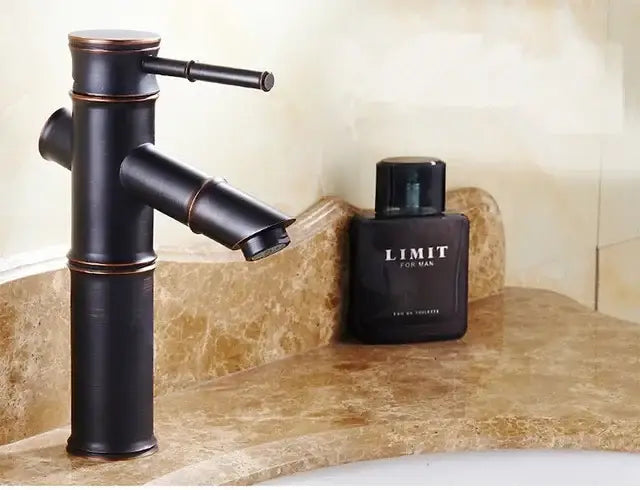Black bamboo style high arch mixer bathroom faucet with bronze accents and waterfall design