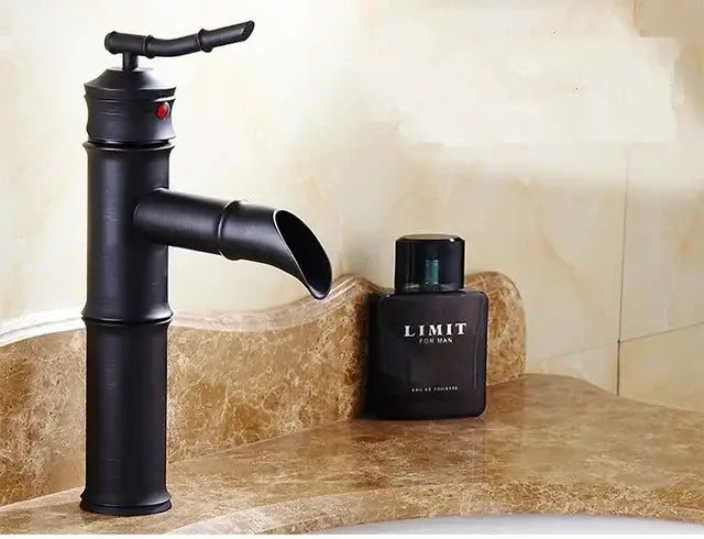 Black bamboo high arch mixer faucet with matte finish and red accent handle for bathroom waterfall use