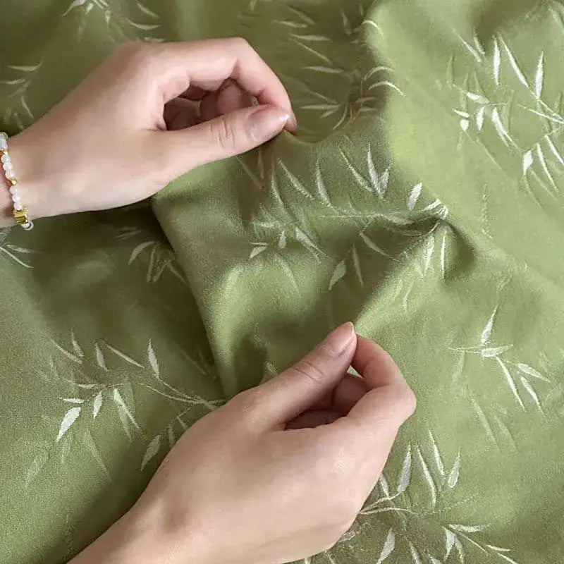 Olive green cotton bedding set with subtle white embroidered bamboo leaf jacquard pattern for bedroom decorbites bamboo leaf
