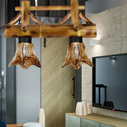 DecorBites bamboo lodge pendant light with natural bamboo frame and two rustic amber glass shades for island lighting
