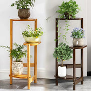 Two tiered bamboo corner plant stands in light natural and dark stained wood for decorative plant display