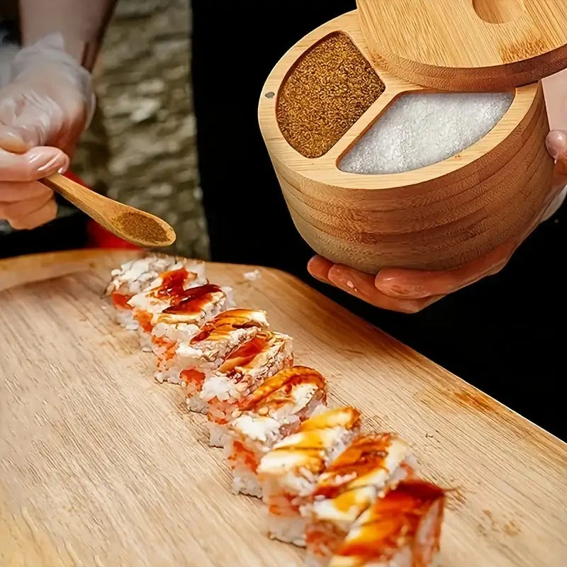 Bamboo seasoning box with divided interior holding brown sesame seeds and white salt by decorbites bamboo seasoning