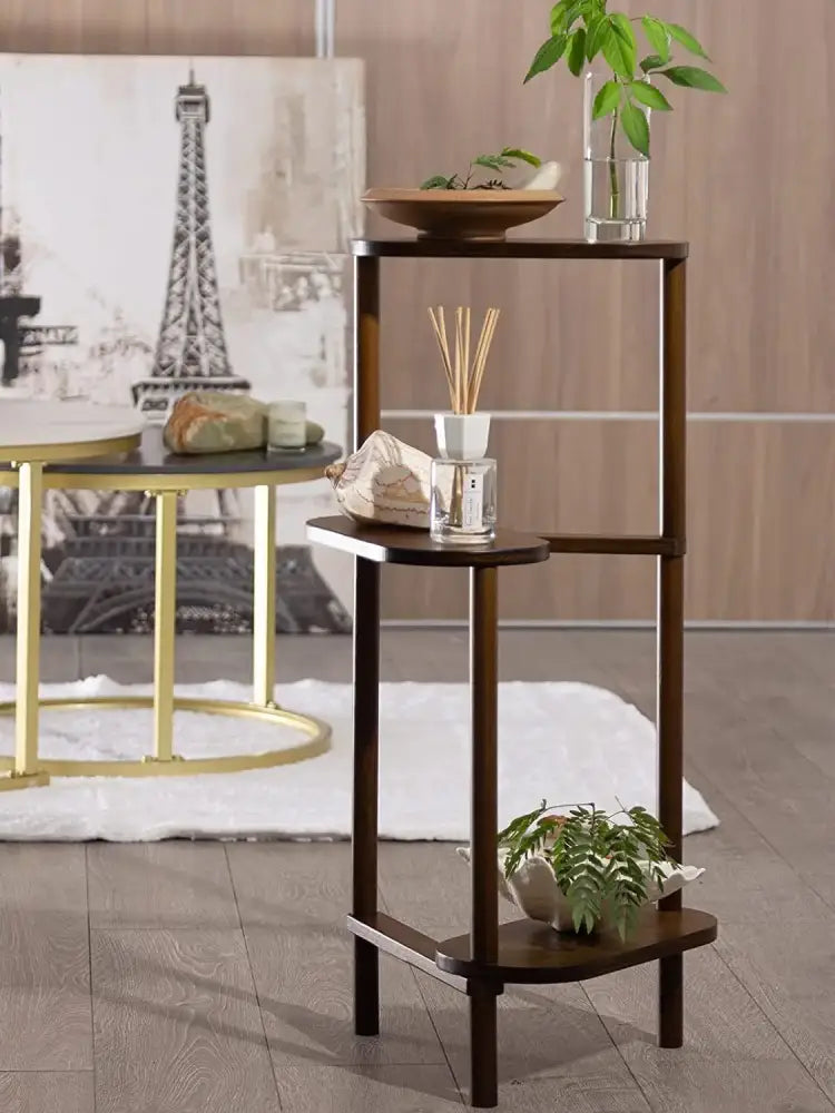 Dark brown wooden bamboo tall corner plant stand with three circular shelves and modern minimalist design