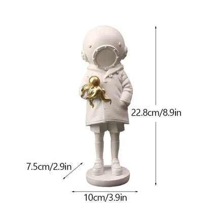 White resin banksy deep diver sculpture featuring an astronaut figurine holding a golden octopus for living room decor