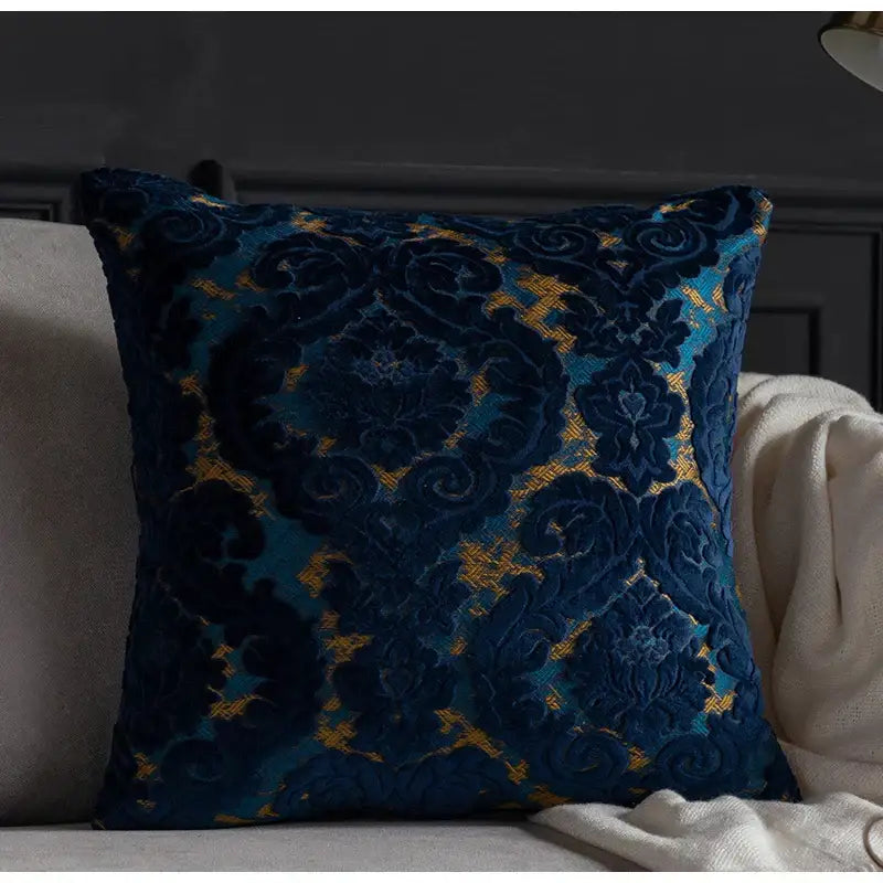 Deep blue velvet throw pillow with intricate gold and teal decorbites damask cut embroidery for luxury cushion covers