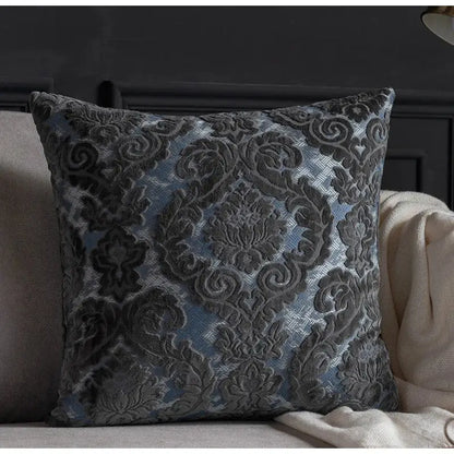 A square cushion cover with dark gray and blue damask cut velvet fabric from decorbites for living room decor