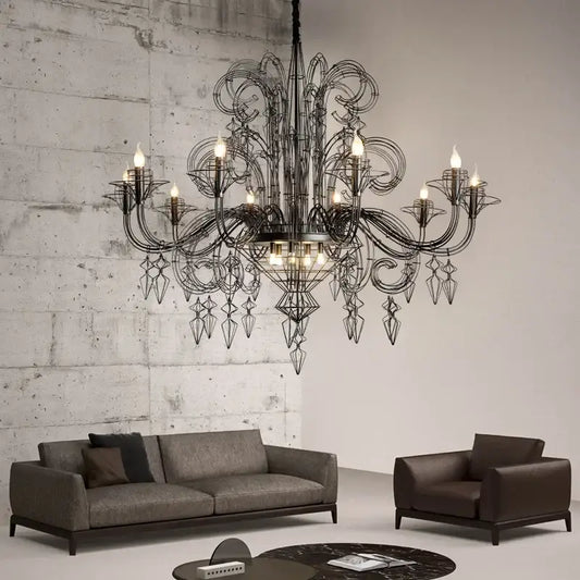 Ornate baroque black candle chandelier with intricate wrought iron arms and geometric crystal pendants for living room decor