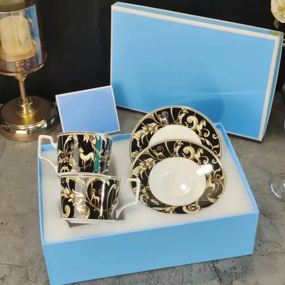 Elegant black and gold porcelain coffee set with deer patterns in a light blue box from black unicorn series kitchenware