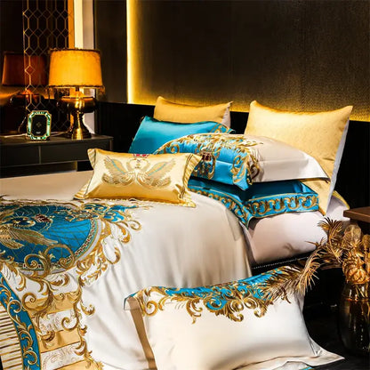 Luxurious cotton bedding set with gold and turquoise baroque embroidery on white, blue, and cream linens