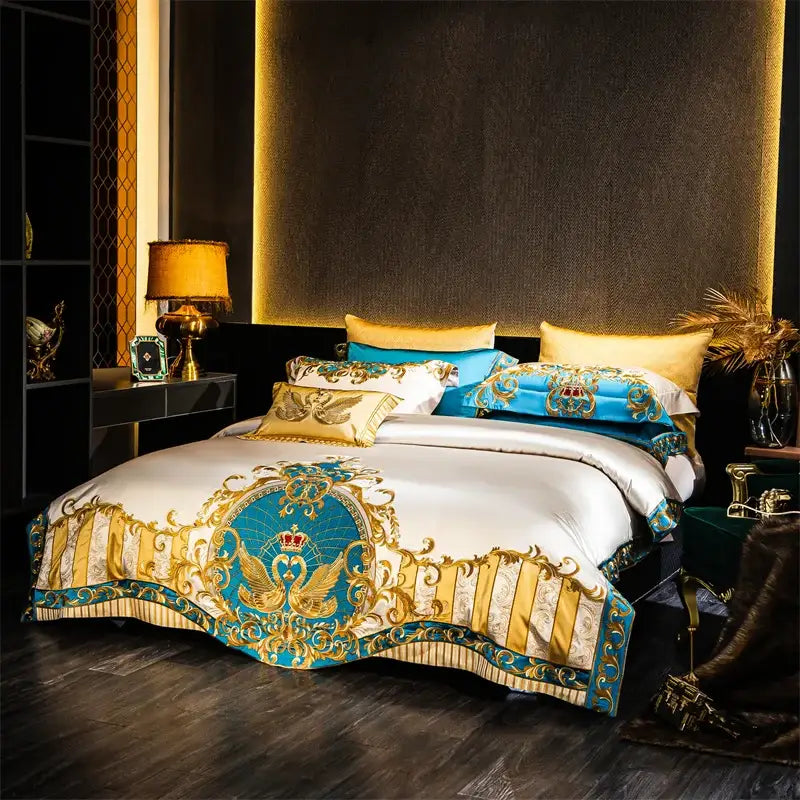 Luxurious baroque blue and gold embroidered cotton bedding set with ornate crest patterns in elegant satin-like fabric