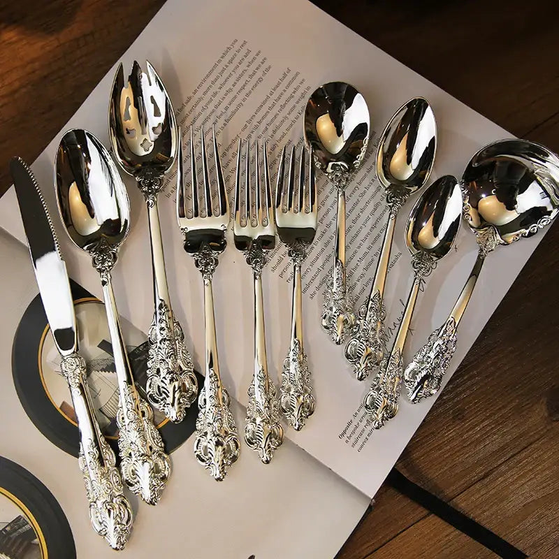 Elegant baroque silver cutlery set 10 pcs with ornate floral handles and polished reflective surfaces by decorbites baroque silver