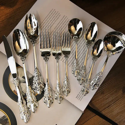 Elegant decorbites baroque silver cutlery set 10 pcs with ornate floral handles and polished reflective surfaces