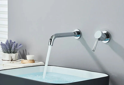 Modern chrome finished basin faucet wall mounted with sleek curved spout and separate handle for hot water control