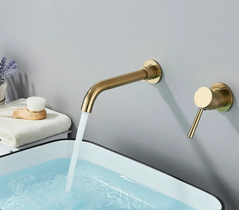 Gold-toned basin faucet wall mounted bathroom faucet with brushed brass finish and hot water control cylindrical handle