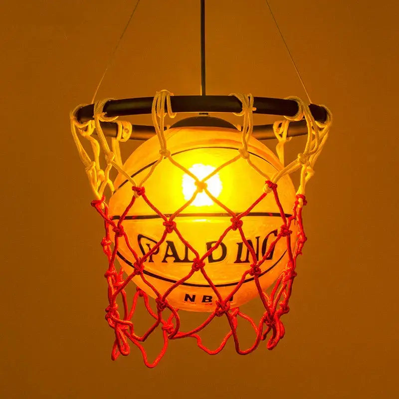 Basketball style pendant light with glowing orange spalding nba basketball in red and white net for kids bedroom decorbites