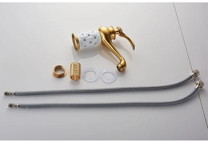 Bathroom faucet antique bronze finish with gold-finished ceramic spout featuring decorative perforations and brass hardware