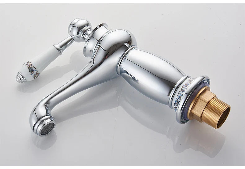 Bathroom faucet antique bronze finish with chrome body white ceramic handle blue floral patterns and brass base