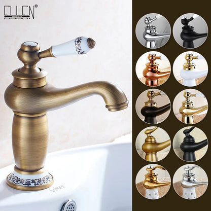 Antique brass-finished single-handle bathroom faucet with ceramic handle and black floral detailing in bronze finish