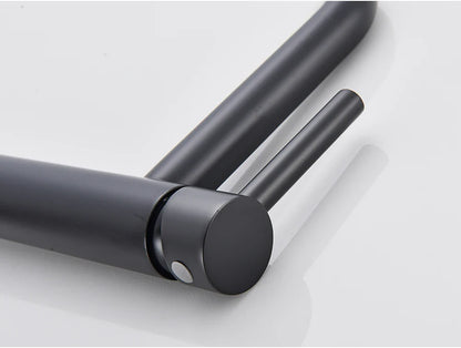 Black matte finished bathroom faucet with sleek cylindrical spout and handle for mixer tap use