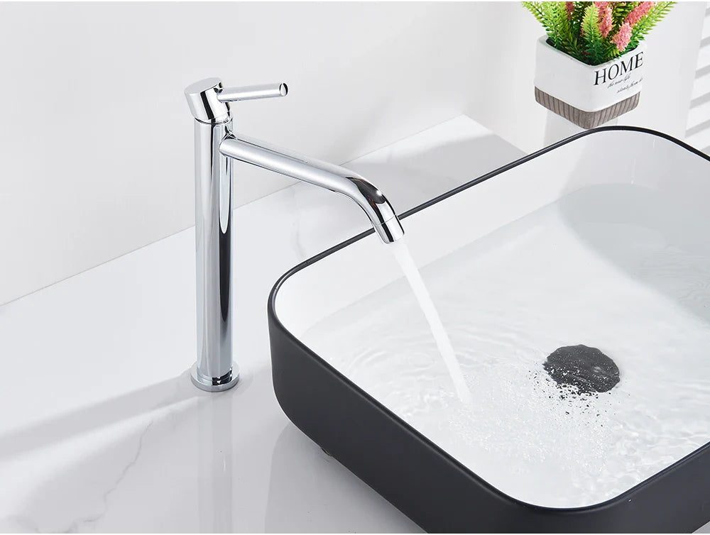 Modern chrome bathroom faucet with sleek tall design and single handle for precise water control