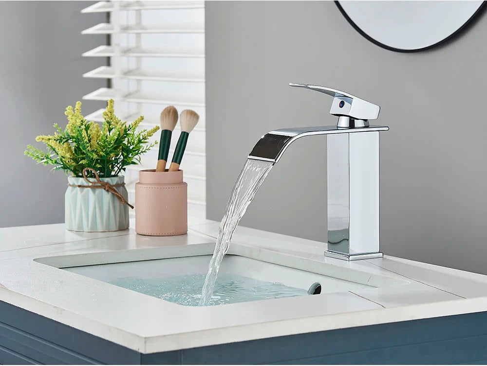 Modern chrome brass bathroom sink faucet with stainless steel waterfall spout and single handle deck mount design