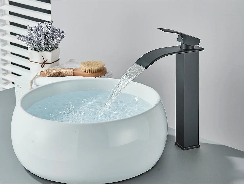 Black matte finish bathroom sink faucet brass deck mount with sleek waterfall design and stainless steel construction