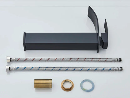 Modern matte black brass deck mount bathroom sink faucet with sleek angular design and stainless steel braided hoses