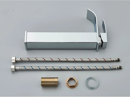 Modern chrome finished bathroom sink faucet brass deck mount with sleek minimalist design and stainless steel handle