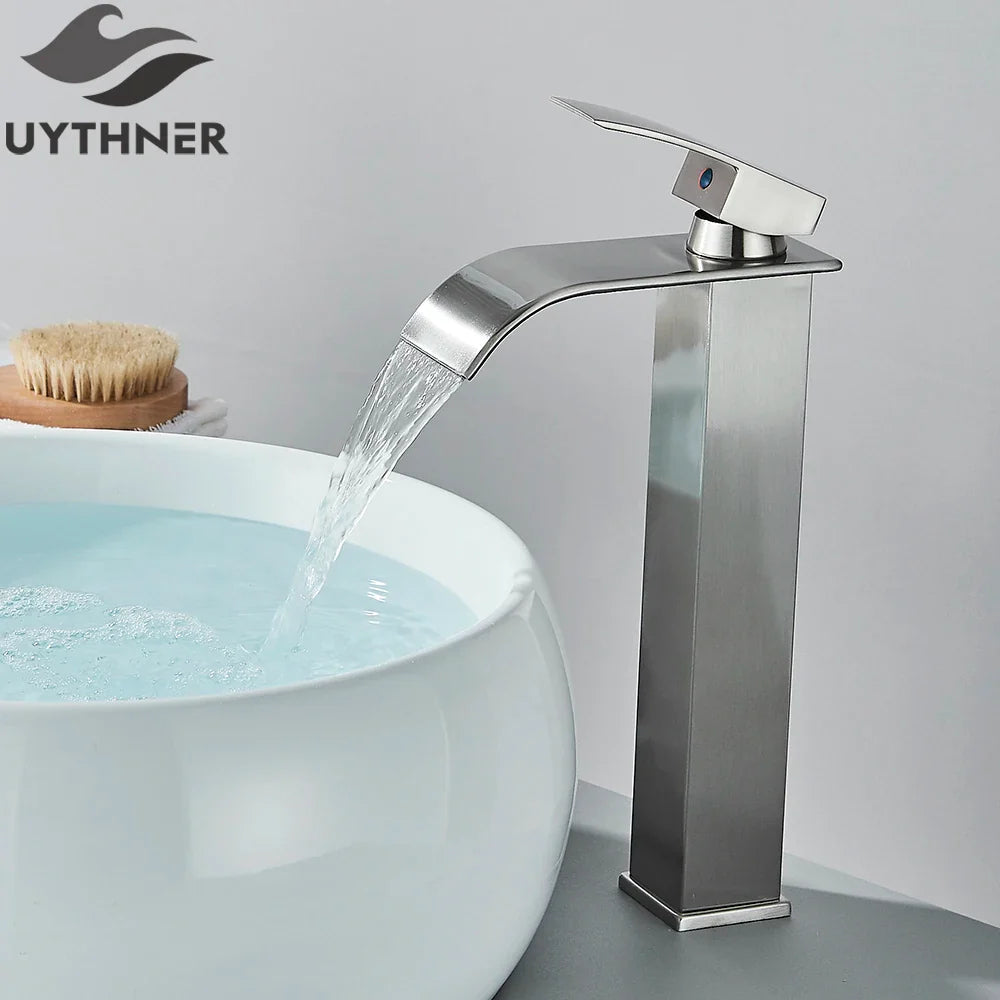 Bathroom sink faucet brass deck mount with stainless steel waterfall design and brushed finish in modern style